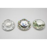 THREE ANTIQUE TEA CUPS AND SAUCERS