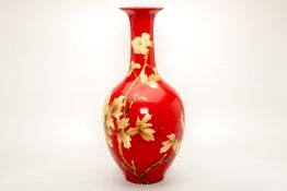 A LARGE RED GLAZED FLOOR VASE