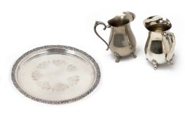 TWO WATER PITCHERS AND A CIRCULAR TRAY
