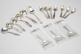A MIXED GROUP OF SILVER AND SILVER PLATED SPOONS AND LADLES