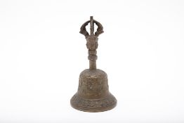 A TIBETAN BRONZE HAND BELL