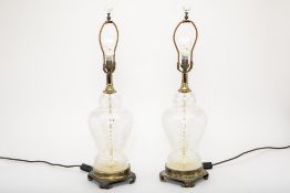 A PAIR OF CUT GLASS TABLE LAMPS