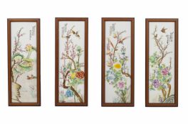 A SET OF FOUR PORCELAIN PLAQUES