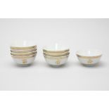 EIGHT SINGAPOREAN PORCELAIN BOWLS & A TEA SET