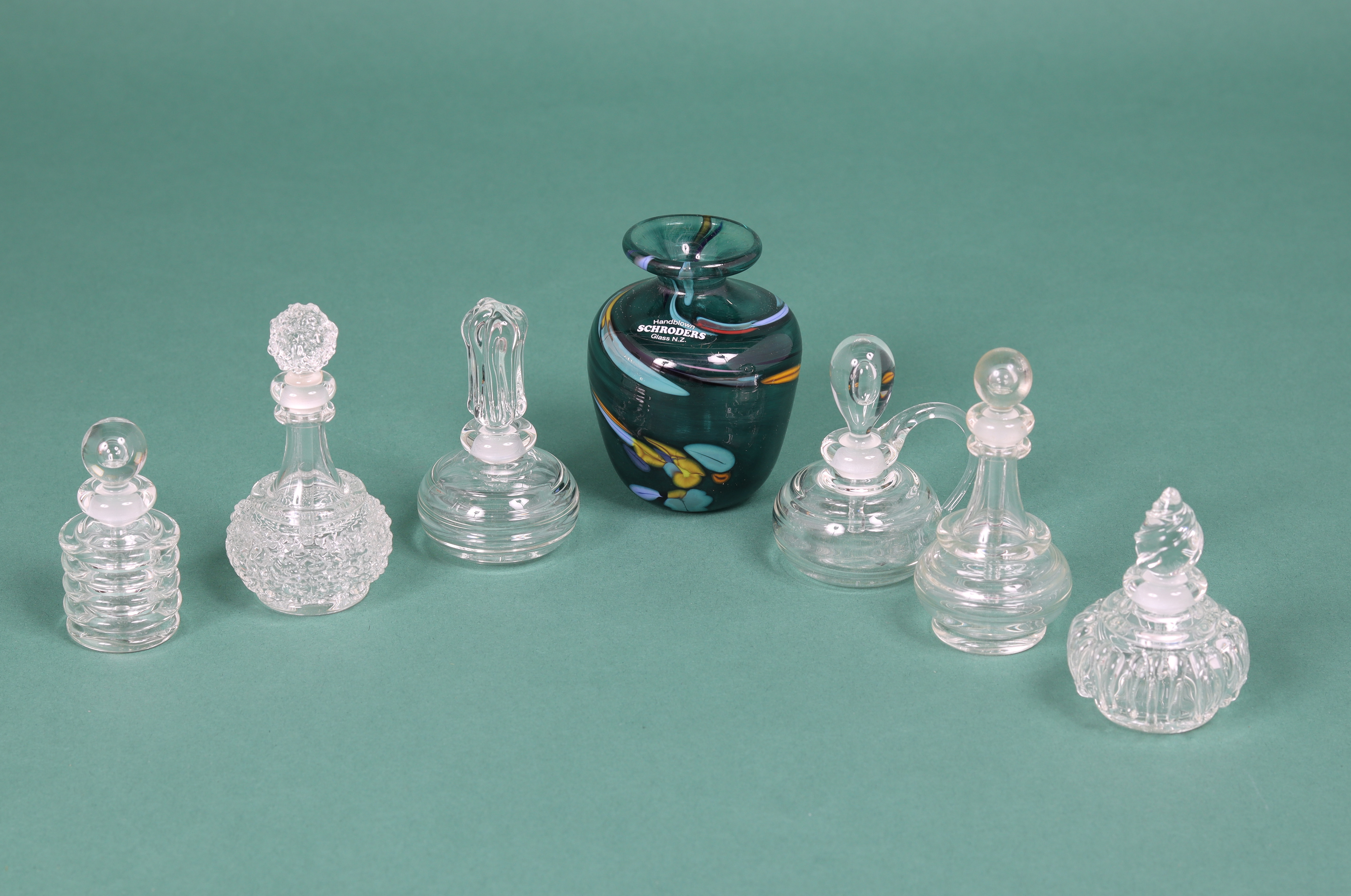 A COLLECTION OF STUDIO GLASS SCENT BOTTLES