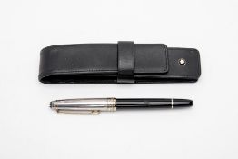 A MONTBLANC FOUNTAIN PEN AND LEATHER CASE