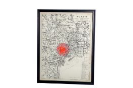 A LARGE FRAMED MAP OF TOKYO