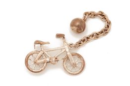 A TIFFANY & CO SILVER BICYCLE CHARM