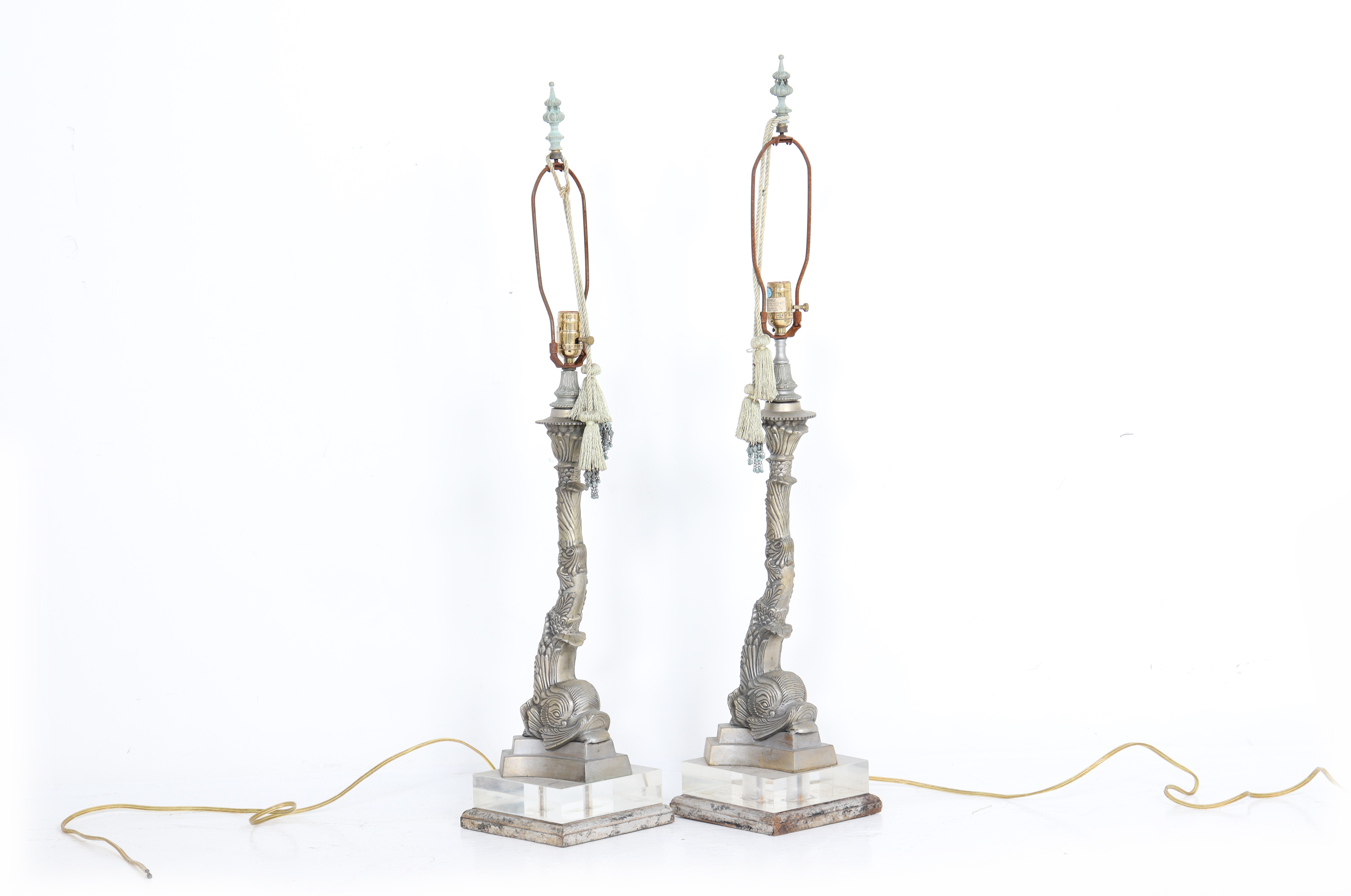 A PAIR OF DOLPHIN FORM TABLE LAMPS