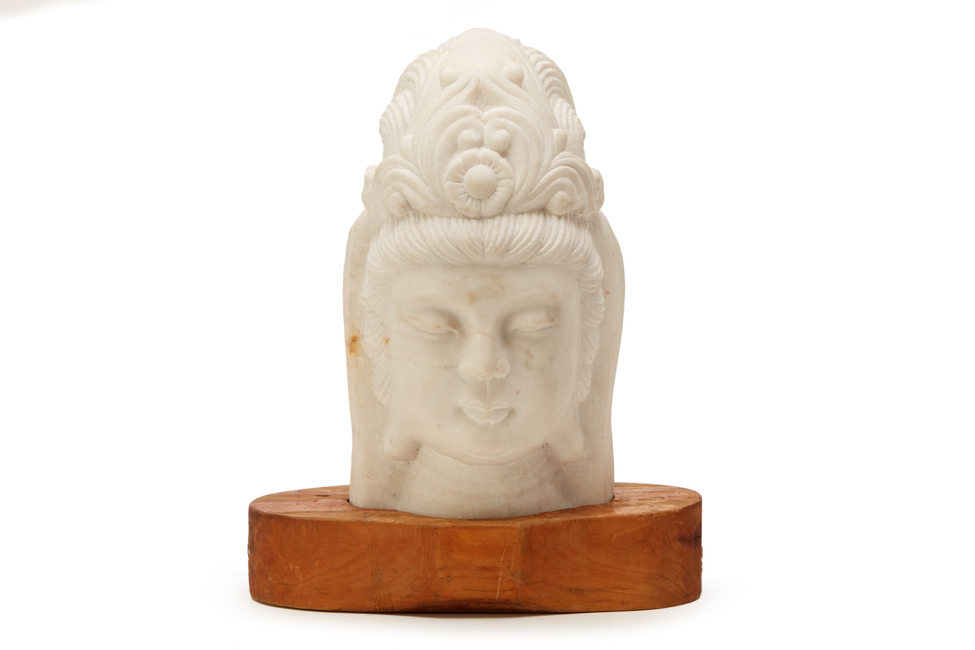 A CHINESE CARVED WHITE MARBLE HEAD OF GUANYIN