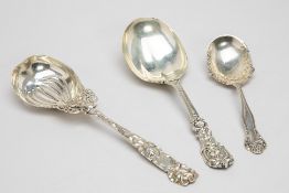 THREE AMERICAN STERLING SILVER SERVING SPOONS