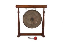 A LARGE GONG ON STAND