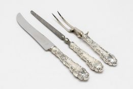 A SILVER HANDLED THREE PIECE CARVING SET