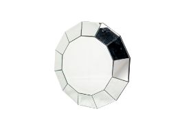 A CONTEMPORARY CIRCULAR WALL MIRROR