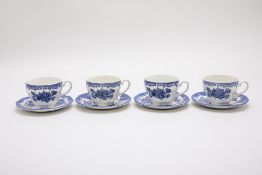 A SET OF FOUR ENOCH WEDGWOOD TEA CUPS AND SAUCERS