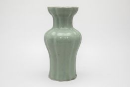 A CELADON GLAZED VASE