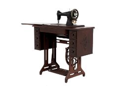 A SINGER SEWING MACHINE