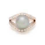 A CULTURED TAHITIAN PEARL AND DIAMOND RING