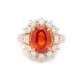 A MANDARIN GARNET AND DIAMOND CLUSTER RING