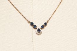 A SAPPHIRE AND DIAMOND PENDANT NECKLACE