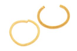 TWO BRAIDED YELLOW GOLD TORQUE ARM BANDS