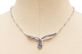 A SAPPHIRE AND DIAMOND TWIST NECKLACE