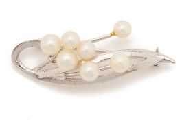 A SILVER AND JAPANESE PEARL BROOCH