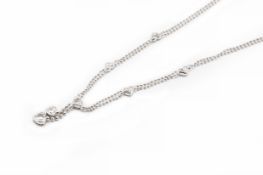 A DIAMOND PENDANT NECKLACE