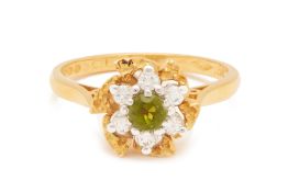 A TOURMALINE AND DIAMOND FLOWERHEAD CLUSTER RING