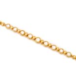 A GOLD AND DIAMOND BRACELET