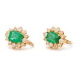 A PAIR OF EMERALD AND DIAMOND CLUSTER EARRINGS