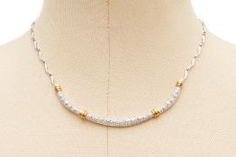 A TWO COLOUR GOLD AND DIAMOND NECKLACE