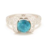 A BLUE ZIRCON AND DIAMOND RING