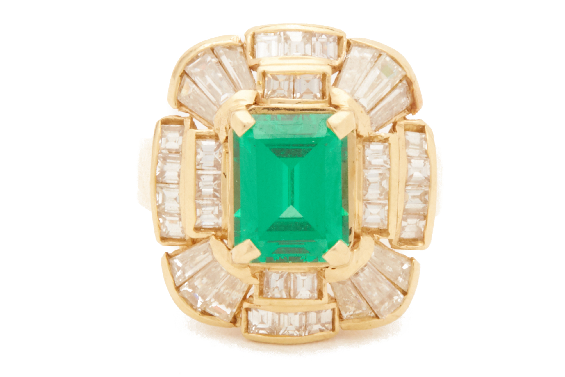 A SYNTHETIC EMERALD AND DIAMOND RING