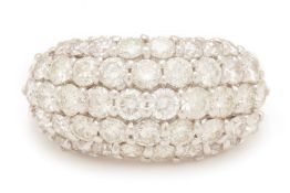 A WHITE GOLD DIAMOND BOMBE RING