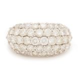 A WHITE GOLD DIAMOND BOMBE RING