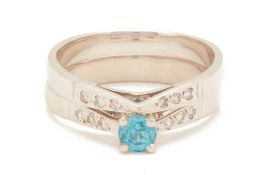 A DIAMOND AND BLUE ZIRCON RING AND DIAMOND RING