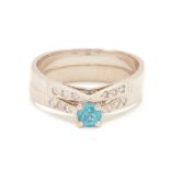 A DIAMOND AND BLUE ZIRCON RING AND DIAMOND RING