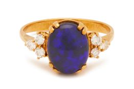 A BLACK OPAL AND DIAMOND RING