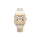 A CARTIER SANTOS STAINLESS STEEL AND GOLD BRACELET WATCH