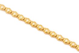 A GOLD AND DIAMOND BRACELET