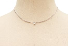 A DIAMOND PENDANT NECKLACE