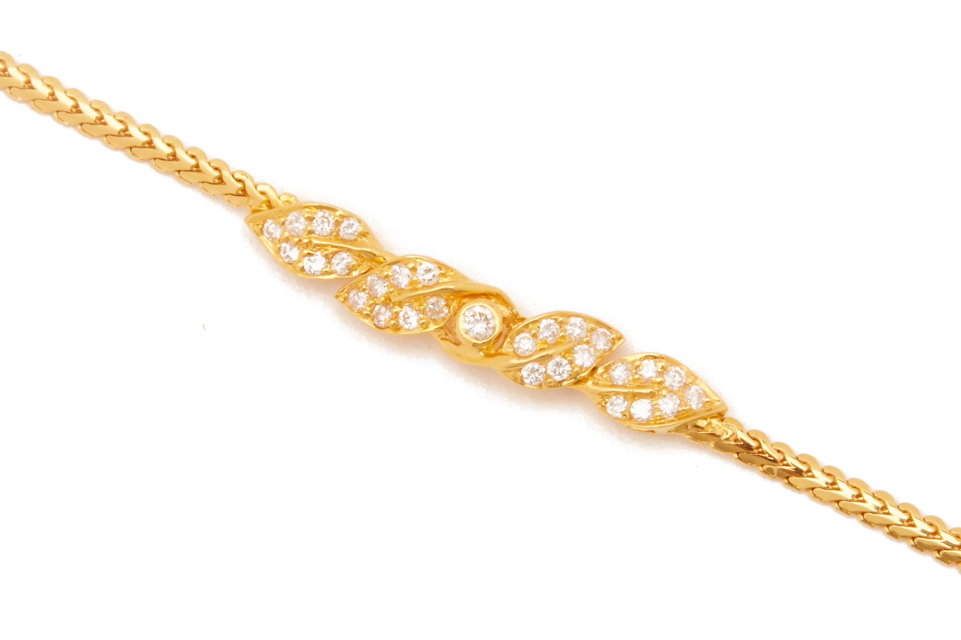 A GOLD AND DIAMOND BRACELET