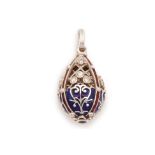 A DIAMOND AND ENAMEL EGG PENDANT