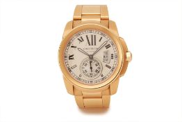 CARTIER CALIBRE DE CARTIER AUTOMATIC GOLD BRACELET WATCH