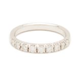 A DIAMOND HALF ETERNITY RING