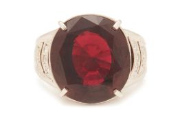 A GARNET AND DIAMOND RING