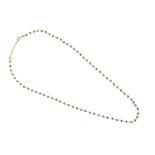 A GOLD AND EMERALD BEAD NECKLACE