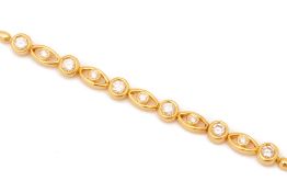 A GOLD AND DIAMOND BRACELET