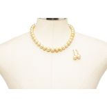 A SOUTH SEA CULTURED PEARL NECKLACE AND EARRINGS